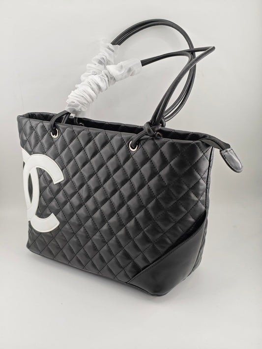 Borsa tote premium in stile pelle trapuntata con doppi manici