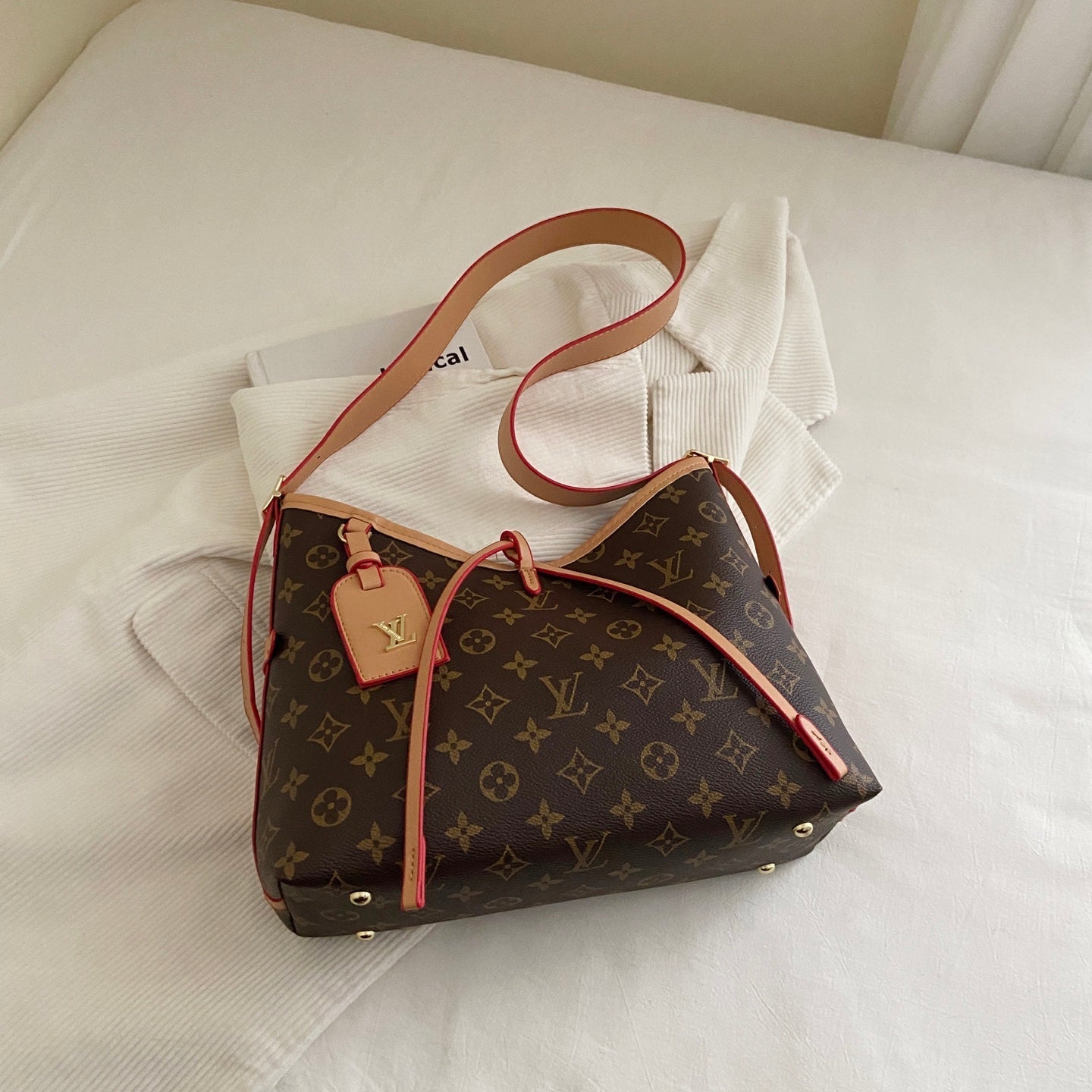 Umhängetasche mit Monogramm-Kreuzriemen