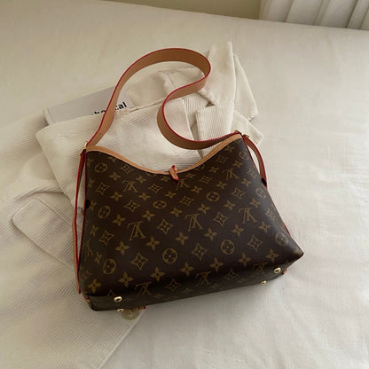 Umhängetasche mit Monogramm-Kreuzriemen