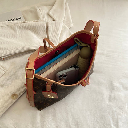 Umhängetasche mit Monogramm-Kreuzriemen