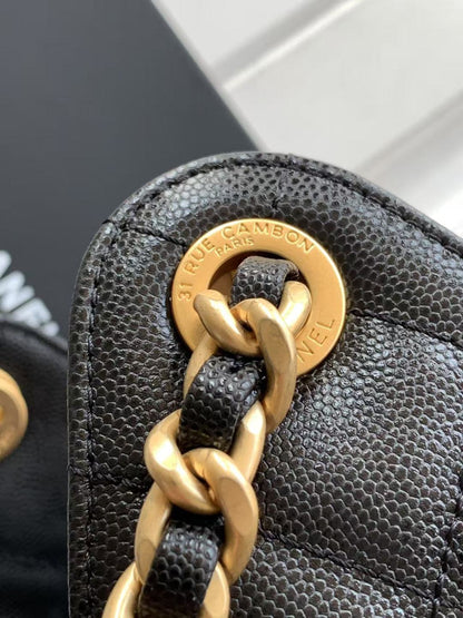 Bolso de mano pequeño CC 25 de piel de becerro granulada y metal dorado