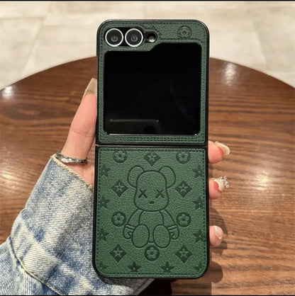 《三星Z Flip系列皮革折疊防摔手機殼，帶指環扣設計》