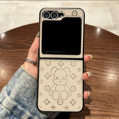 《三星Z Flip系列皮革折疊防摔手機殼，帶指環扣設計》