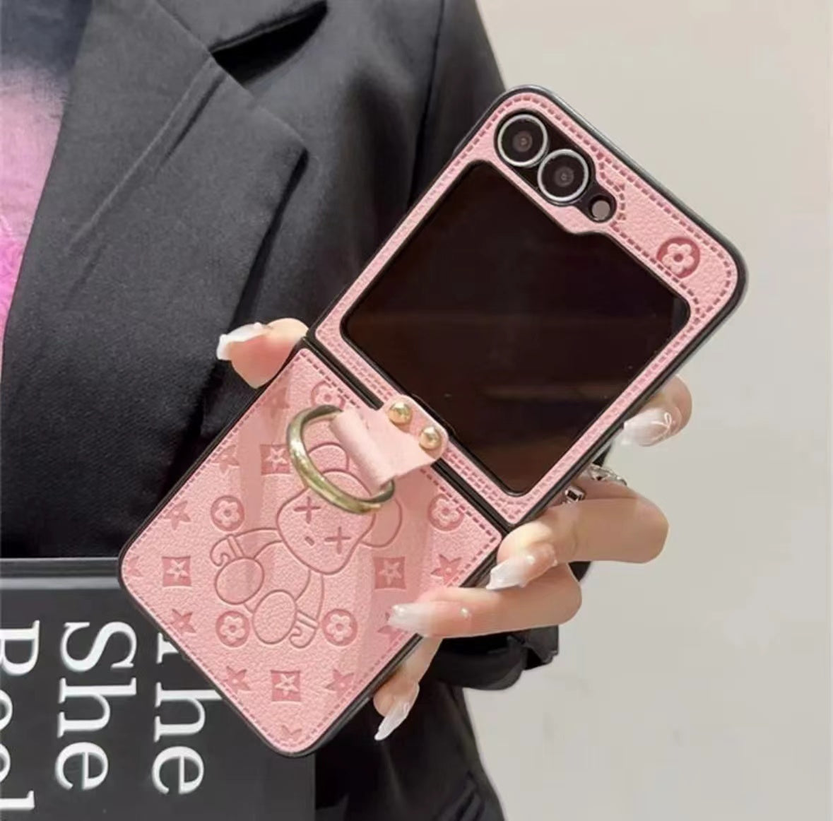 《三星Z Flip系列皮革折疊防摔手機殼，帶指環扣設計》