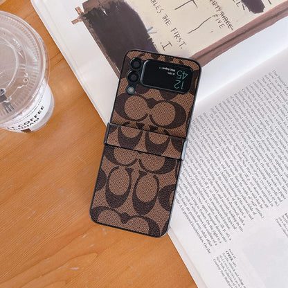 Coach Z フリップ/Z フォールド サムスン 携帯電話ケース フィンガー ストラップ付き