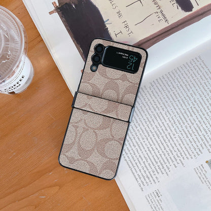 Coach Z フリップ/Z フォールド サムスン 携帯電話ケース フィンガー ストラップ付き